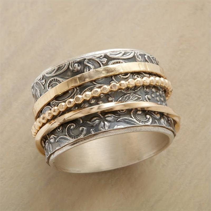 Antikinspirerad guld- och silverring